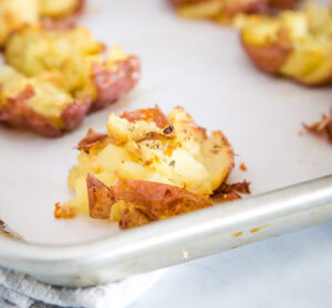 A close up of a plate of food, with Potato