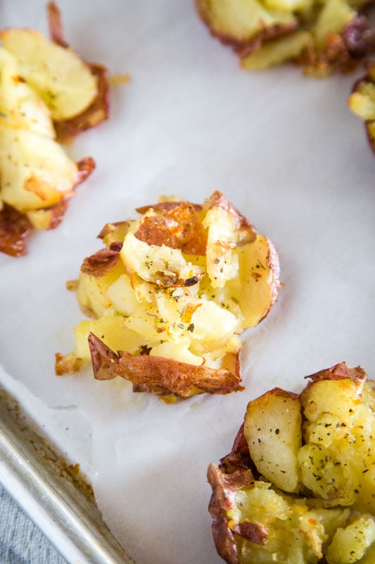 Potatoes are the perfect side dish. These are boiled, smashed and baked until crispy and delicious