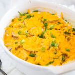 A bowl of cheesy potatoes, with Dinner and Gratin