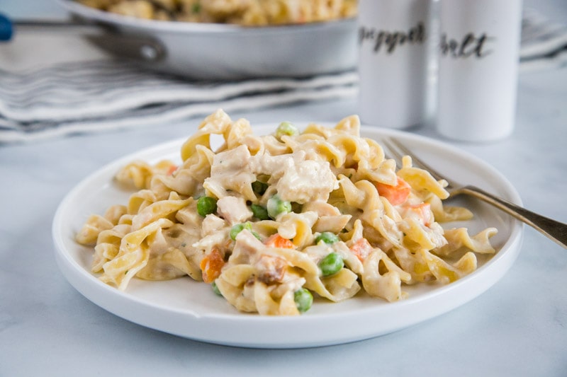 Chicken Pot Pie Noodles - a fun twist on classic chicken pot pie using noodles!  Comes together in minutes so it is perfect for quick weeknight meals.