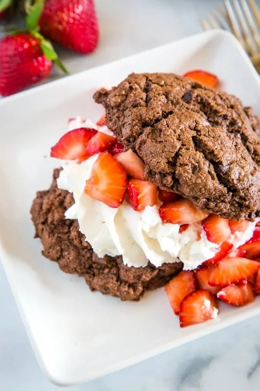 Chocolate strawberry shortcake with fresh whipped cream and lots of strawberries
