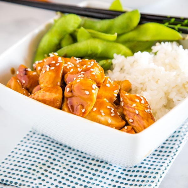 Honey Teriyaki Chicken Bowls - dinner does not get much easier than this!  Pieces of tender chicken cooked in a slightly sweet teriyaki sauce and served over rice.  