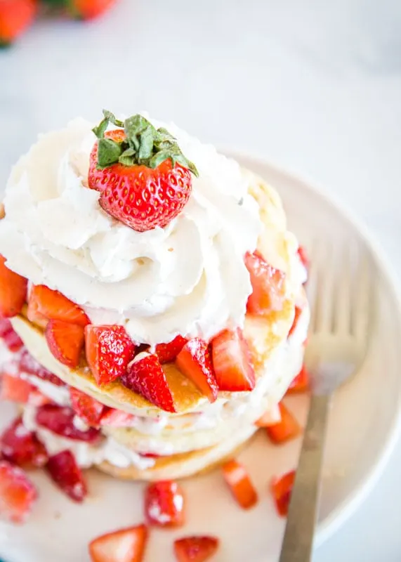 Have strawberry shortcake for breakfast with these over the top delicious pancakes!