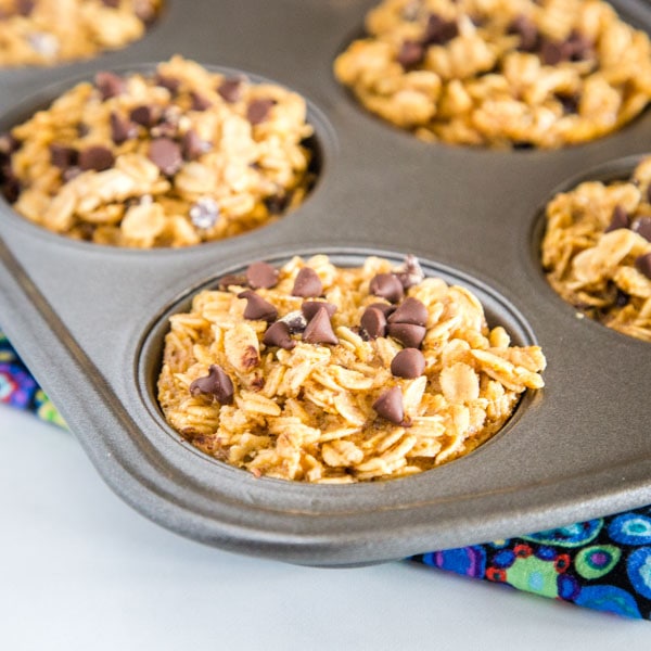 Baked Oatmeal Cups - a single serve way to make baked oatmeal ahead of time.  Have these in the fridge or freezer for quick and easy breakfasts all week long.  Lots of ways to mix up the flavors for the whole family!