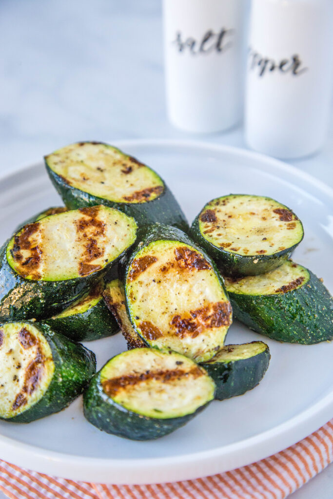 zucchini that has been grilled on white plate