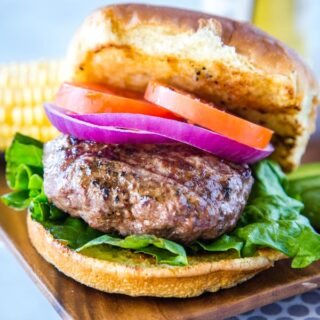 The Best Classic Hamburgers - homemade hamburgers are simple but absolutely delicious.  Just a few staple ingredients and you have a thick and juicy burger that is perfect for any summer day! 