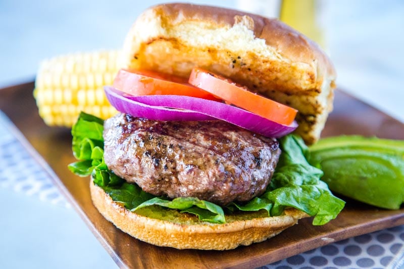 The Best Classic Hamburgers - homemade hamburgers are simple but absolutely delicious.  Just a few staple ingredients and you have a thick and juicy burger that is perfect for any summer day!  
