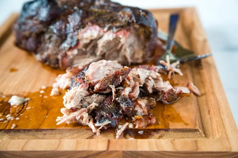 Smoked Pork Butt - A super simple recipe with just a few ingredients for the most tender, juicy, and delicious pulled pork!  Add your favorite sauce or just dive in!  