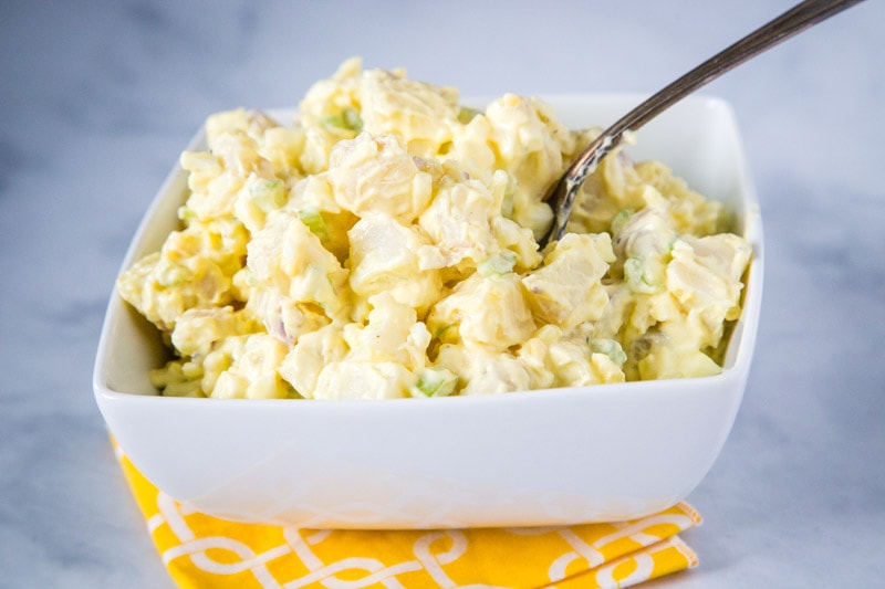 Classic Potato Salad - a homemade potato salad that is just like mom used to make.  Super creamy, tangy, easy to make and the perfect addition to any summer meal!