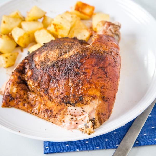 Smoked Chicken - a whole smoked chicken that is super tender, juicy, and full of flavor.  A great way to get dinner on the table the whole family will love. 