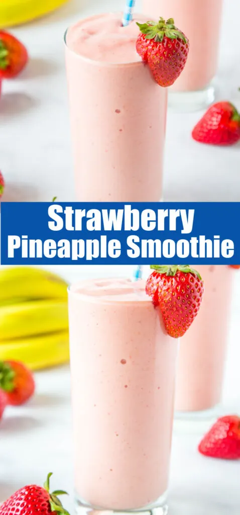 strawberry pineapple smoothie in a glass with a straberry on the rim