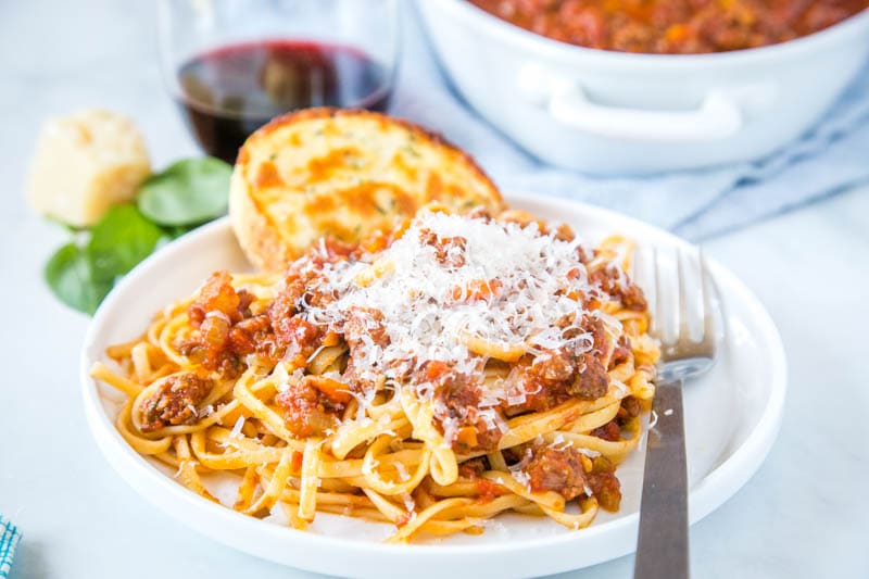 Instant Pot Bolognese - make Italian style bolognese sauce in the Instant Pot.  So rich and delicious and ready in a fraction of the traditional recipe! 