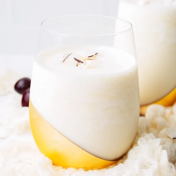 Pina Colada - A classic tropical cocktail with coconut, pineapple and rum! Simple, easy and delicious with no mix required!