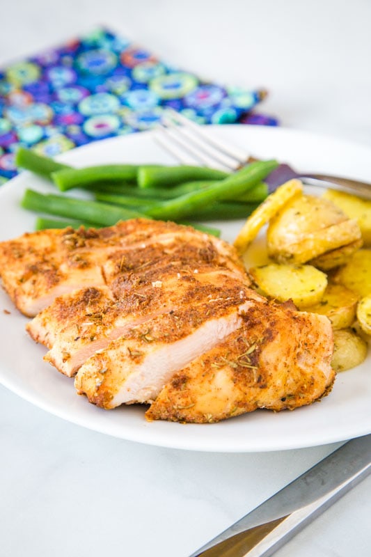 sliced chicken breast on white plate