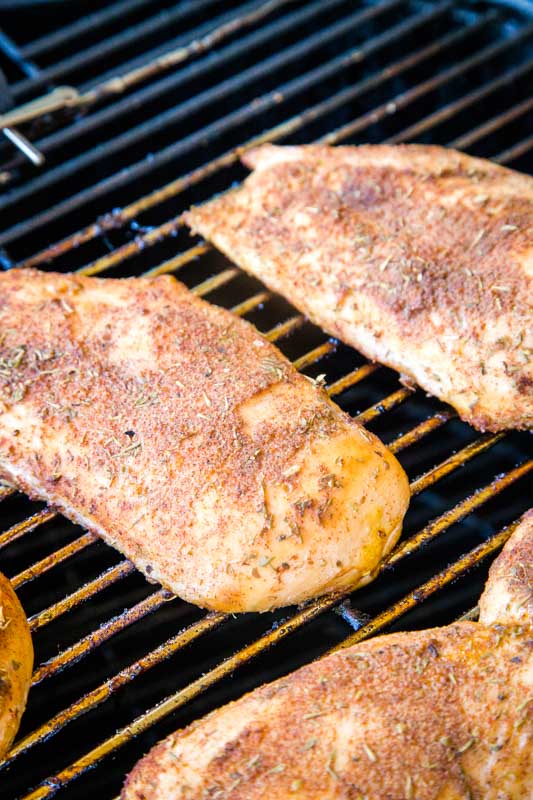 Smoked chicken breast on the grill
