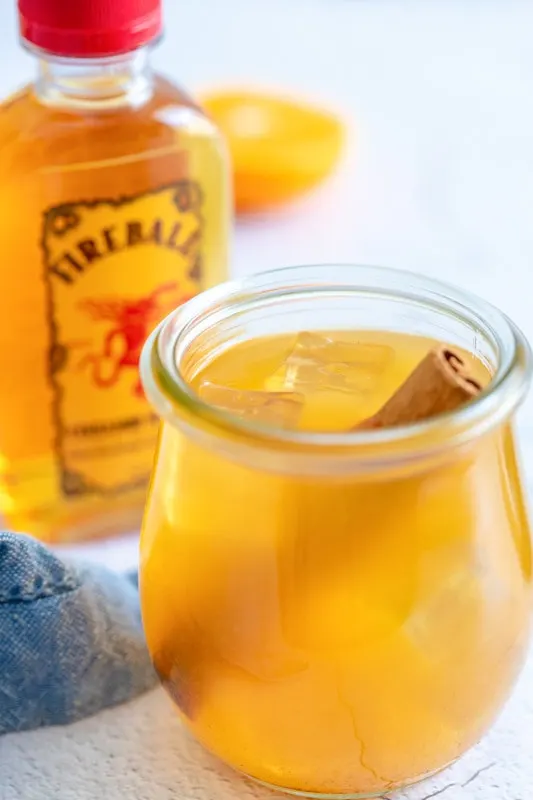 close up of apple cider cocktail in a glass