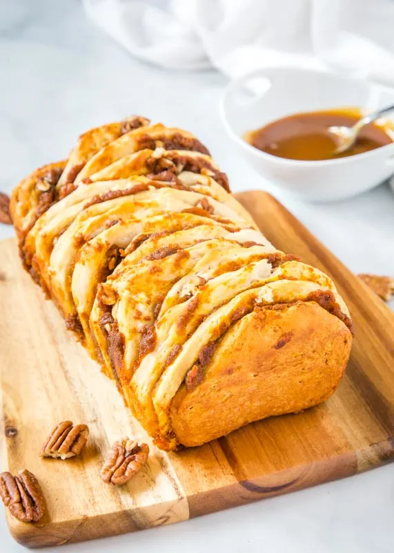 pumpkin pull apart bread on cutting board