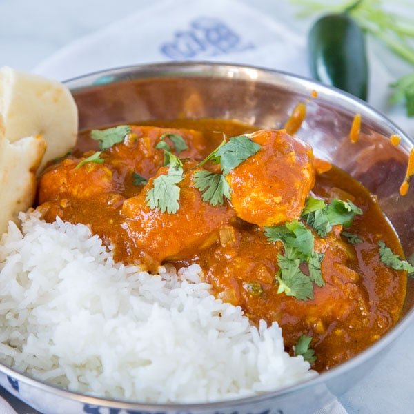 Chicken Vindaloo - A spicy Indian curry you can make at home. Lots of spices some together for a super flavorful dinner. Serve over rice or with naan bread.