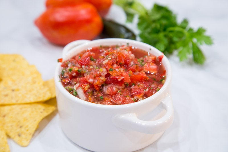 fresh salsa in bowl with chips