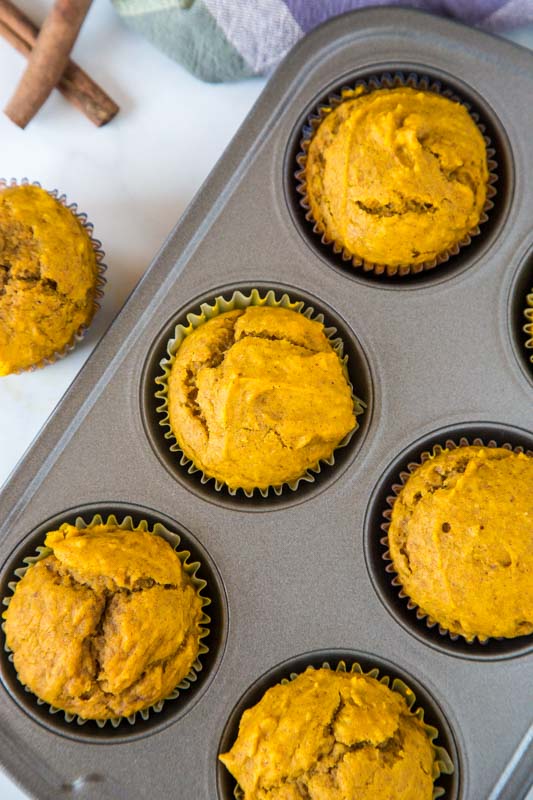 pumpkin muffins in muffin tin