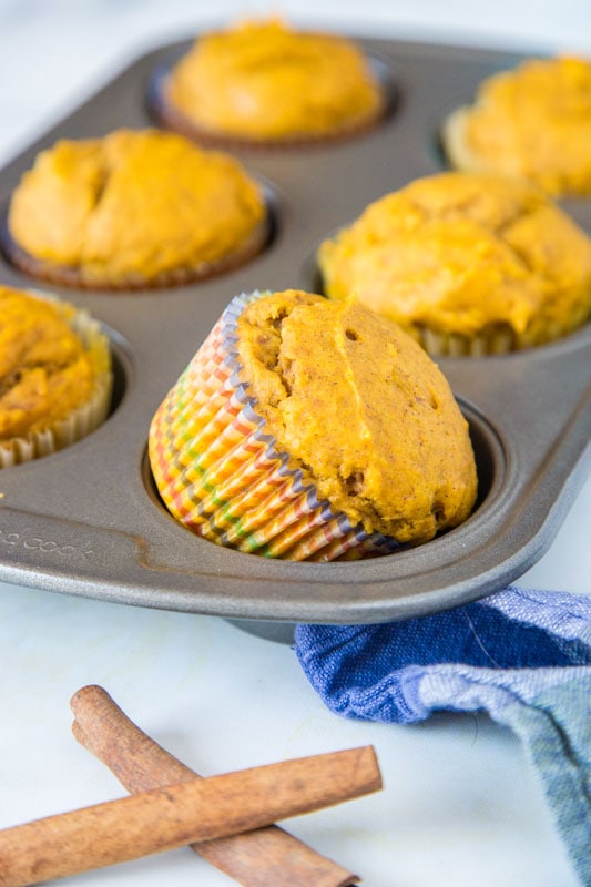 pumpkin muffins in muffin tin