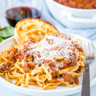 Instant Pot Bolognese - make Italian style bolognese sauce in the Instant Pot. So rich and delicious and ready in a fraction of the traditional recipe!