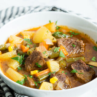 Instant Pot Vegetable Beef Soup - tender beef and vegetables in a hearty and easy to make soup that the whole family will love!