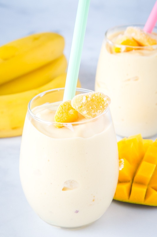 smoothie in a glass with mango