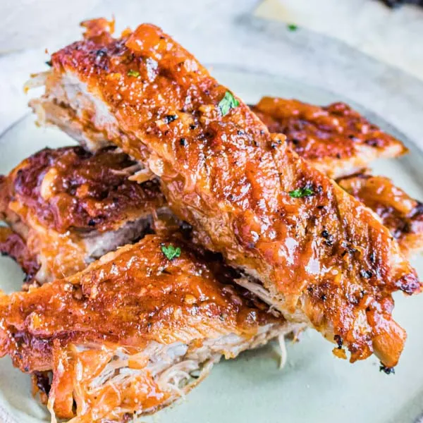 baby back ribs cut and served on a plate