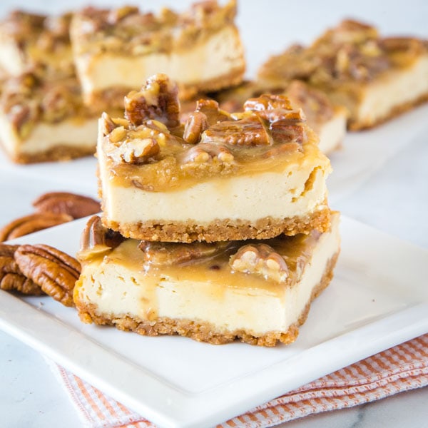 cropped picture of praline bars on white plate