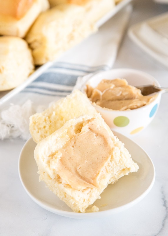 roll with cinnamon honey butter spread on it