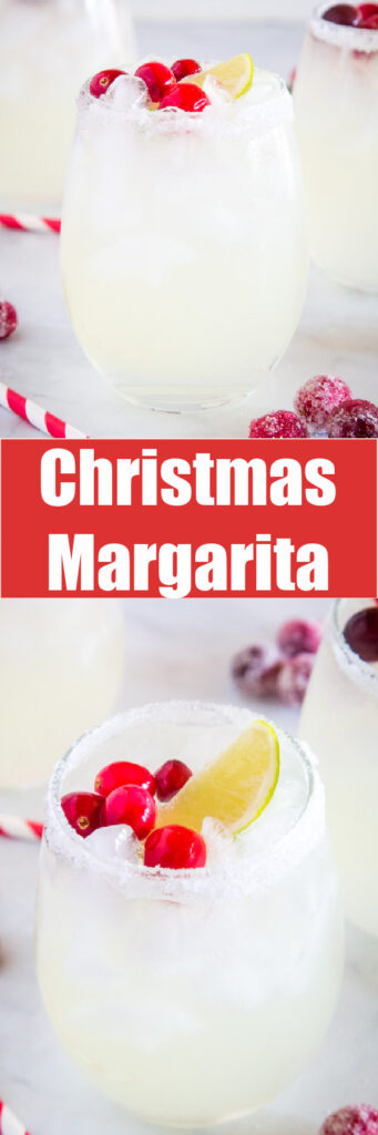 christmas margarita in glass with cranberries and lime wedge