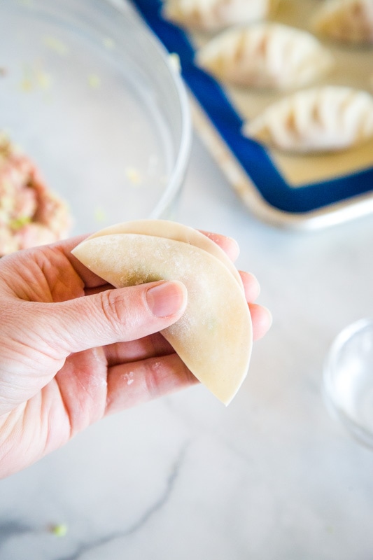fold dumpling in half