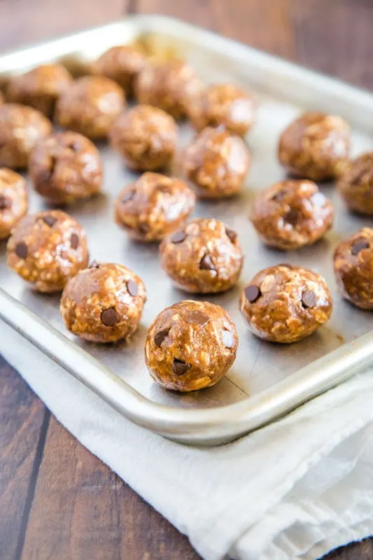 protein balls rolled on baking sheet