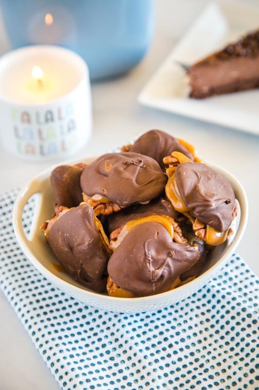 turtle candy in a bowl with candle in the background