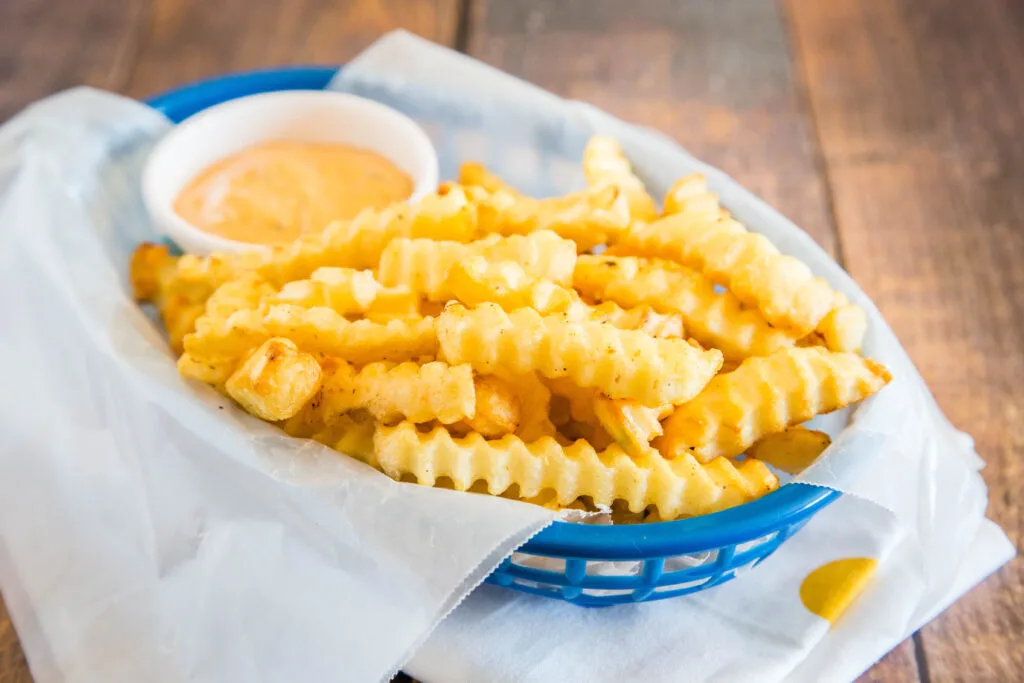 close up of a basket of french fries