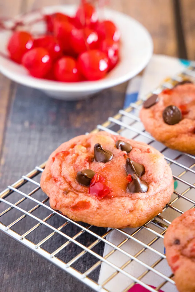 cherry cookies on a cooling rack
