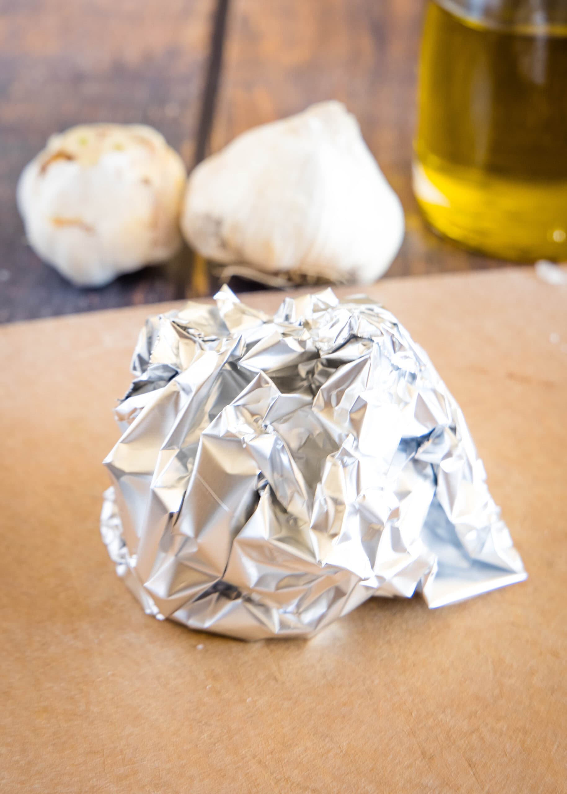 ball of aluminum foil on a cutting board