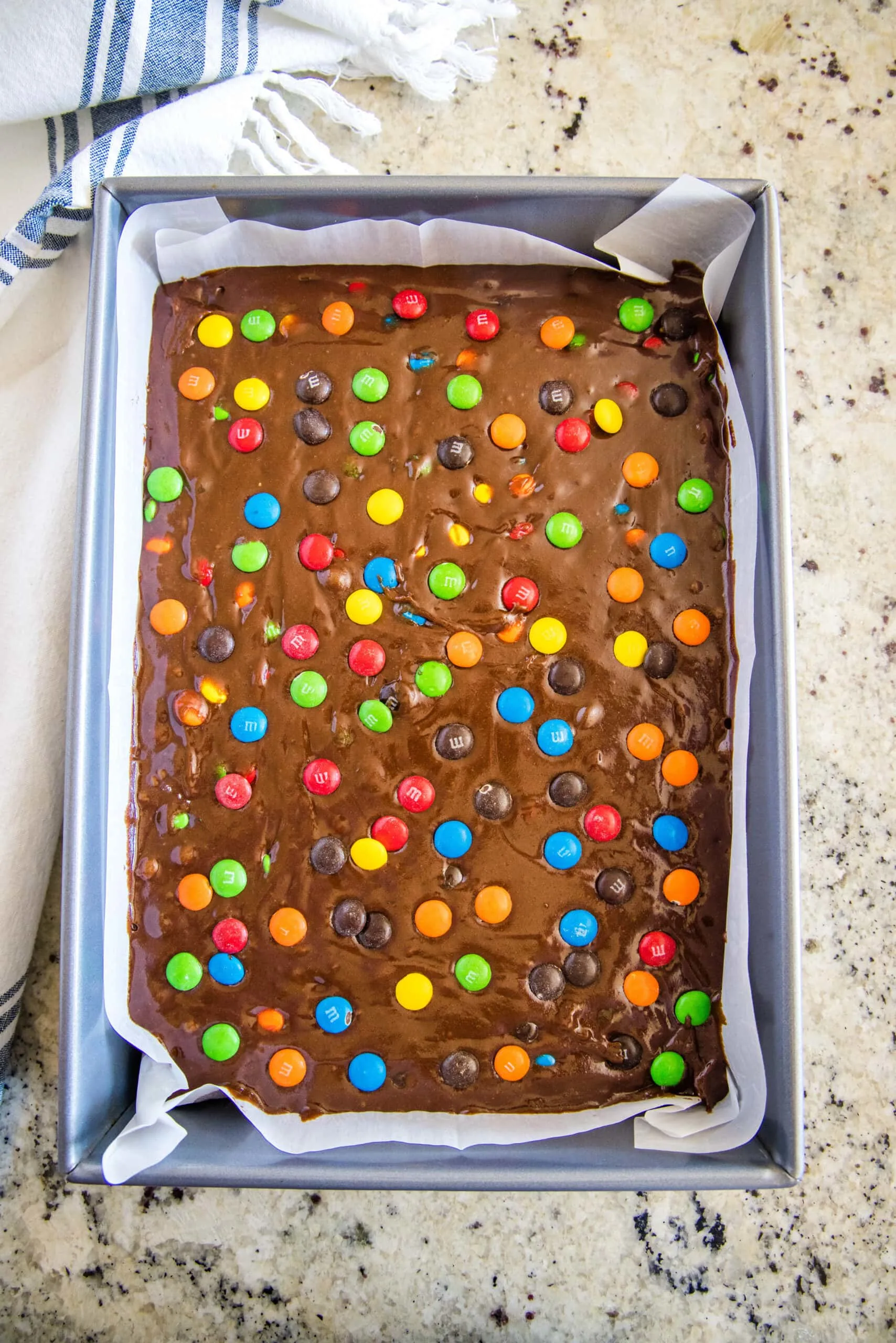 M&M brownies in pan ready for the oven