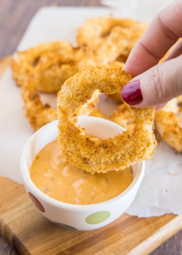 air fryer onion ring in dipping sauce