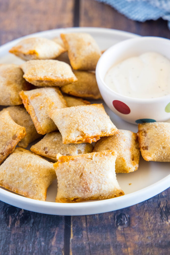 totinos pizza rolls on white plate