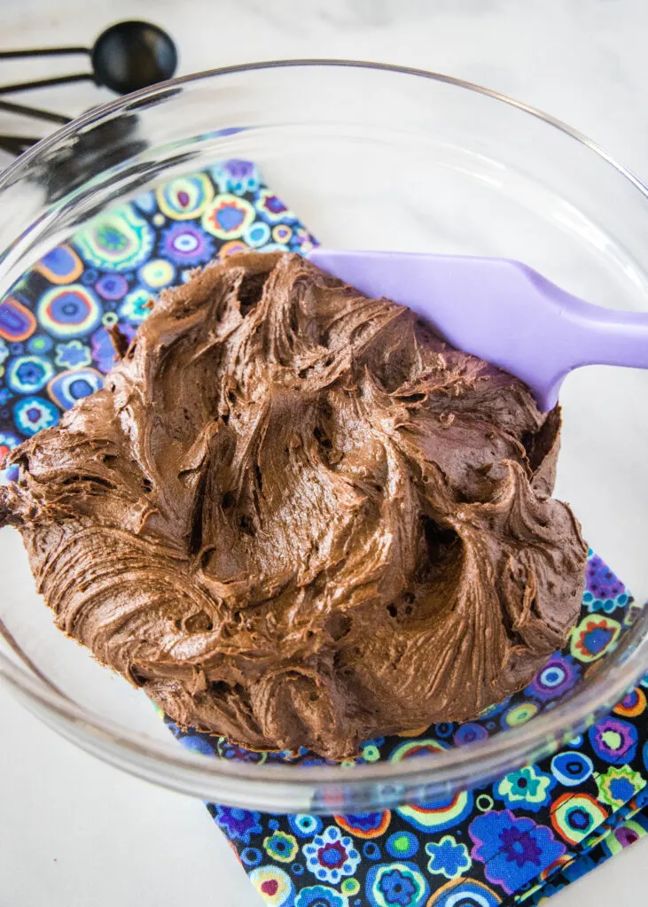 bowl filled with chocolate frosting
