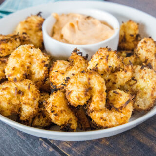 Air Fryer Coconut Shrimp - crispy coconut crusted shrimp cooked in the air fryer (oven recipe included). Super crispy, crunchy, slightly sweet and delicious.