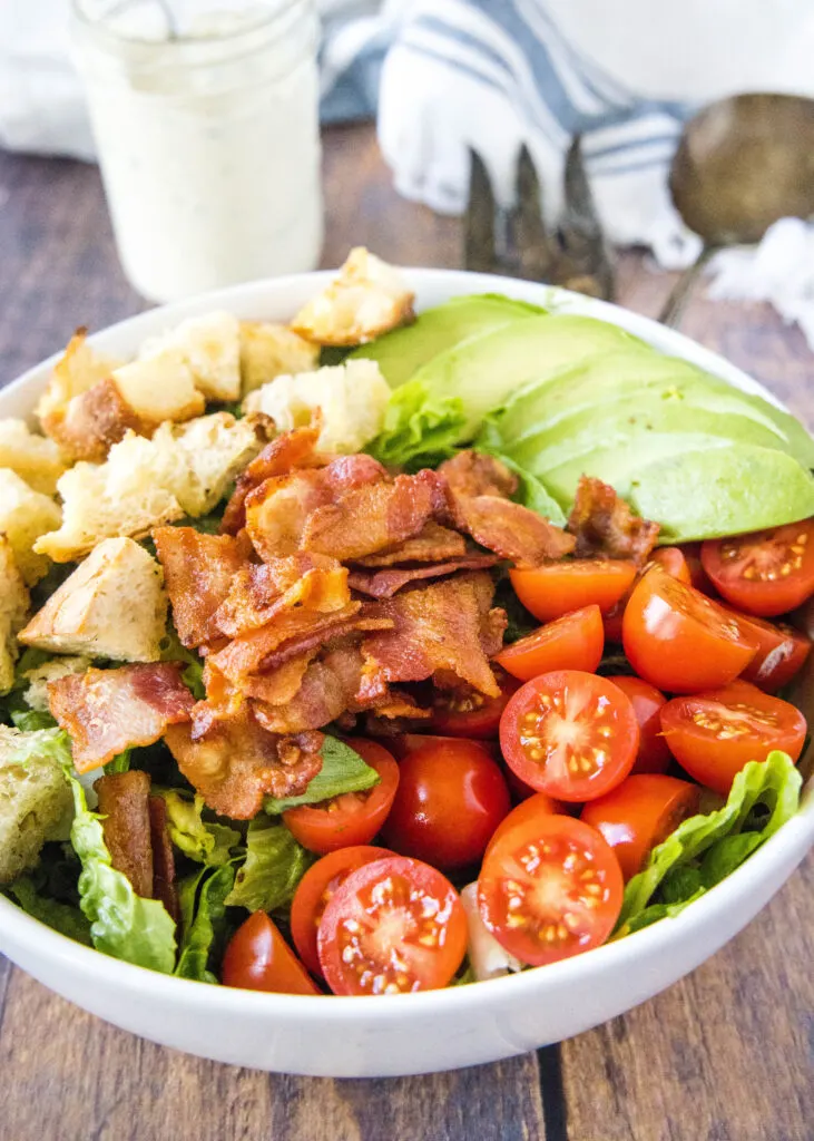 BLT salad ingredients arranged in a bowl