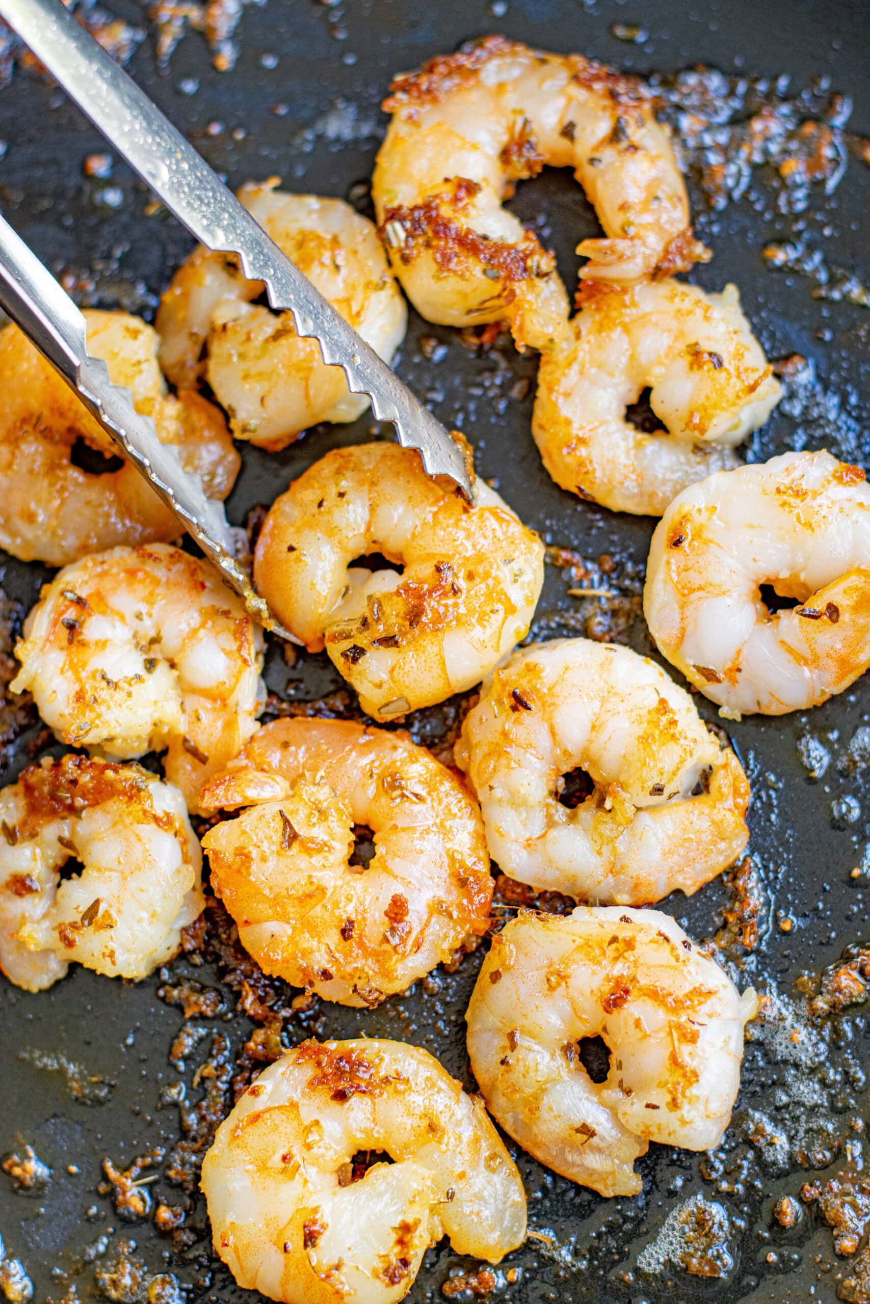 shrimp cooking in a skillet