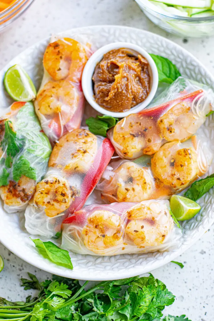 summer rolls on plate with dipping sauce