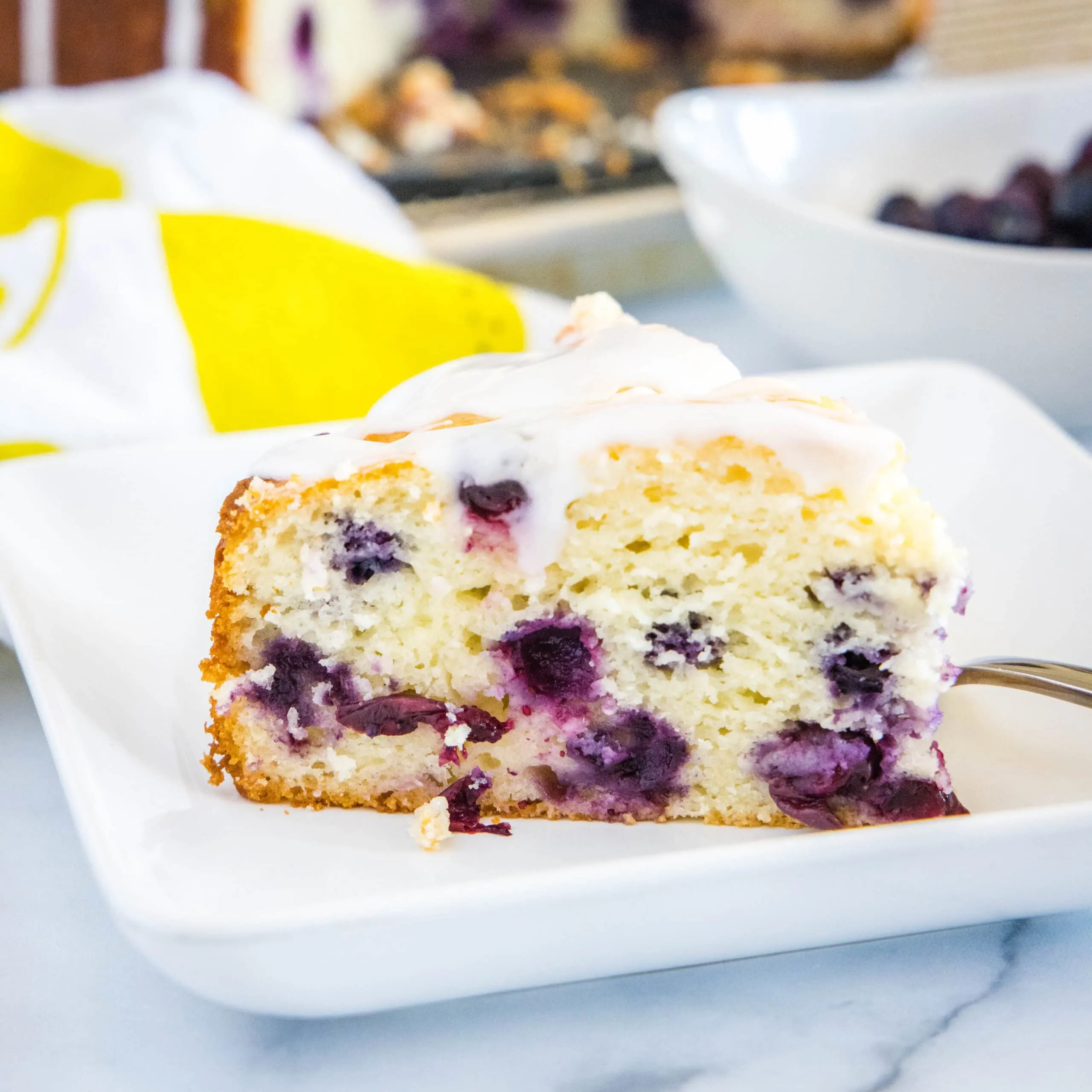 cropped in close up of lemon blueberry cake