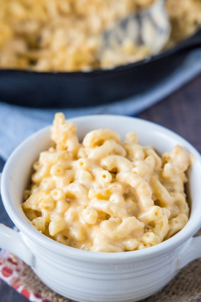 mac and cheese in a white bowl