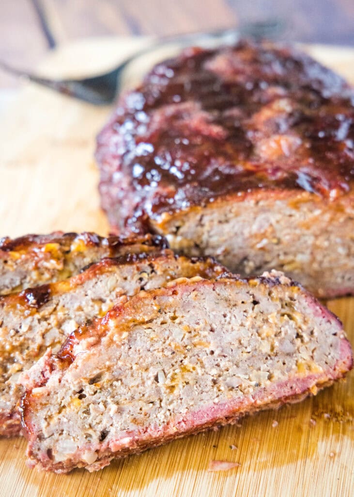 sliced meatloaf on a cutting board