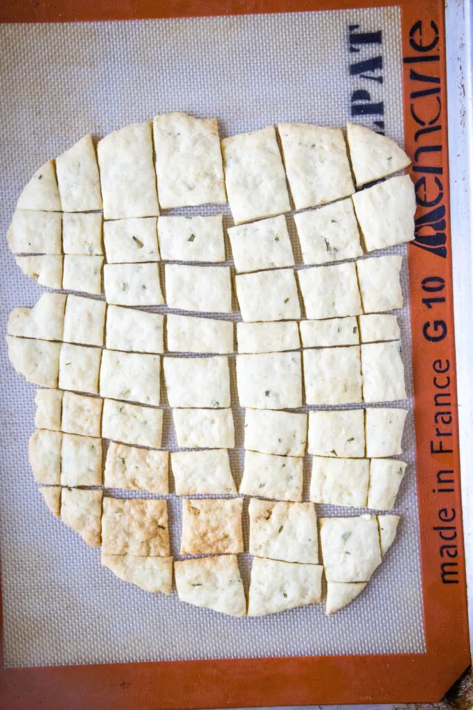 baked crackers on a baking mat